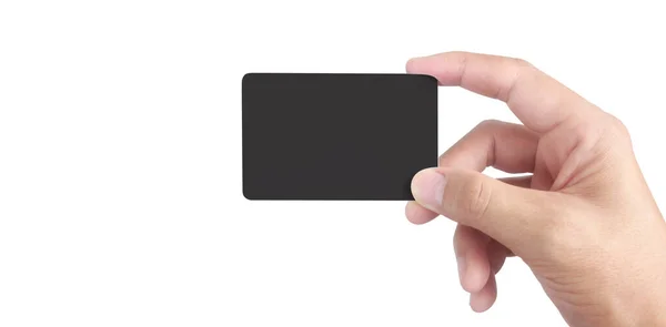 手拿着空白的黑色卡片的特写镜头 信用卡被隔离了 — 图库照片