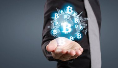 Eller bitcoin simgesini dijital üzerinde sanal para olarak gösterir