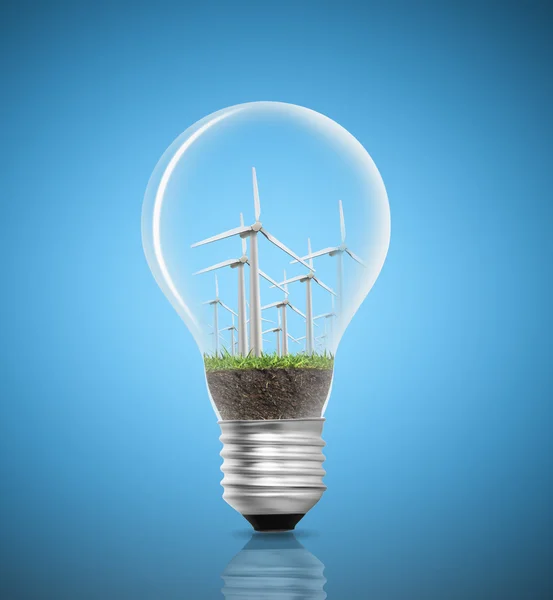 電灯の電球と緑のエネルギー — ストック写真