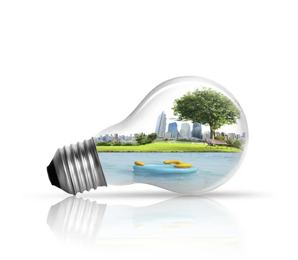 Electric light bulb and  green energy — Stock Photo, Image