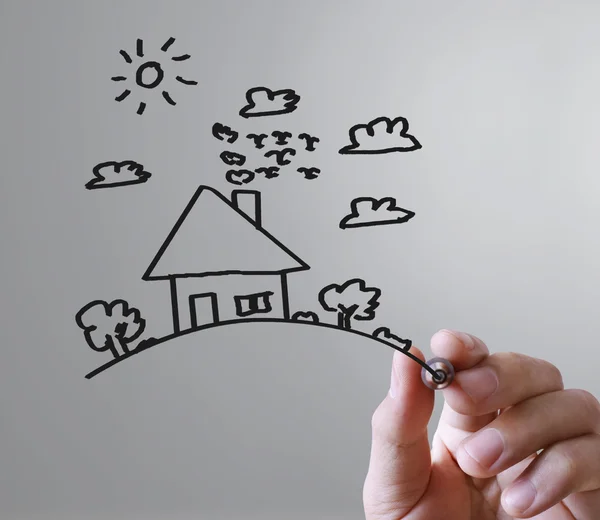 Hand tekening huis in whiteboard — Stockfoto