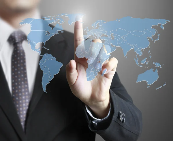 Business man touching world — Stock Photo, Image