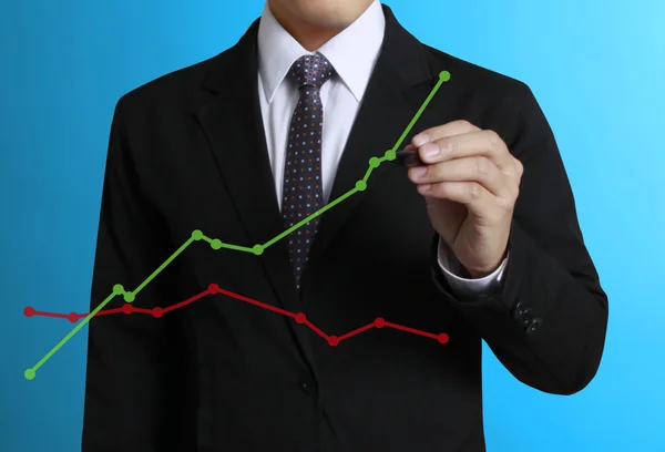 Business man hand drawing  graph Stock Photo