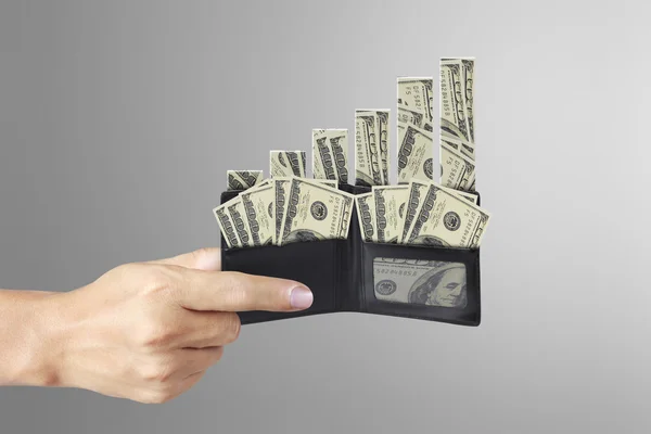 Hands as he is getting a banknote out of his wallet — Stock Photo, Image