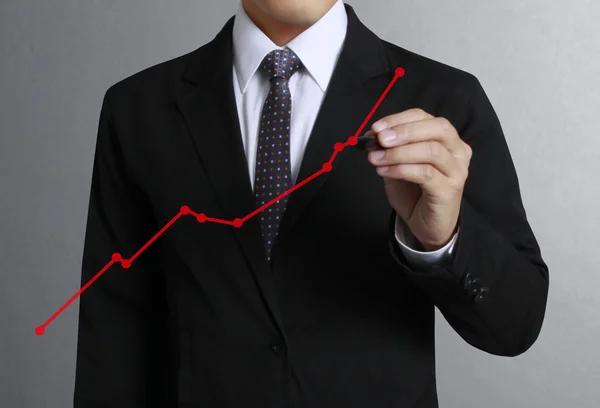 Business man hand drawing  graph — Stock Photo, Image