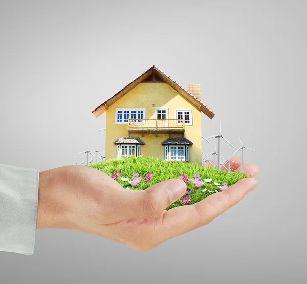 Hausmodellkonzept in der Hand — Stockfoto