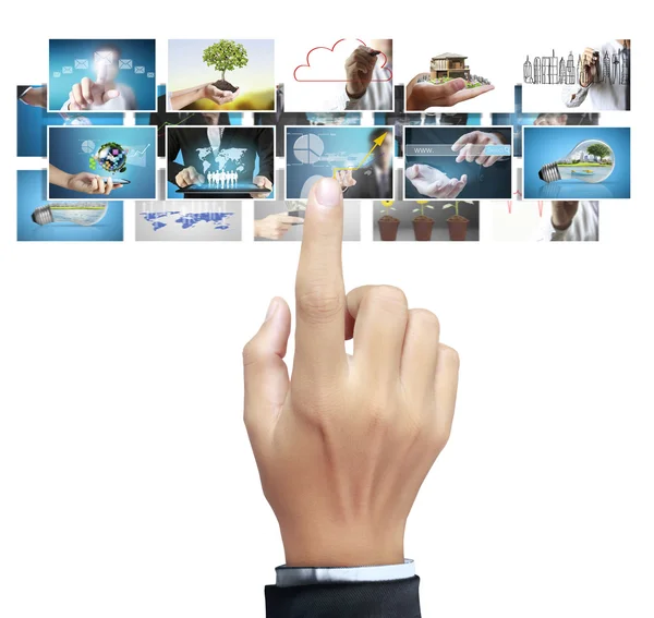 Businessman choosing digital photos — Stock Photo, Image
