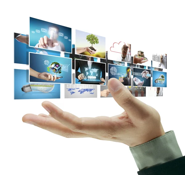 Businessman holding a screen with digital photos — Stock Photo, Image