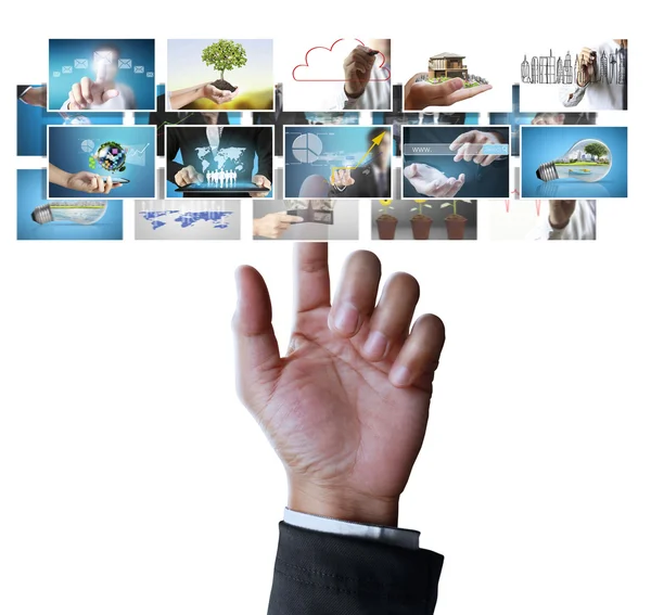 Man pushing on a touch screen digital photos — Stock Photo, Image