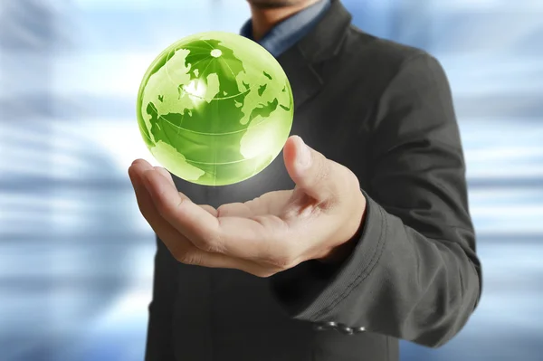 Holding a glowing earth globe in his hands. Earth image provided — Stock Photo, Image