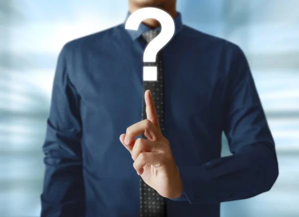 Businessman holding question mark symbol — Stock Photo, Image