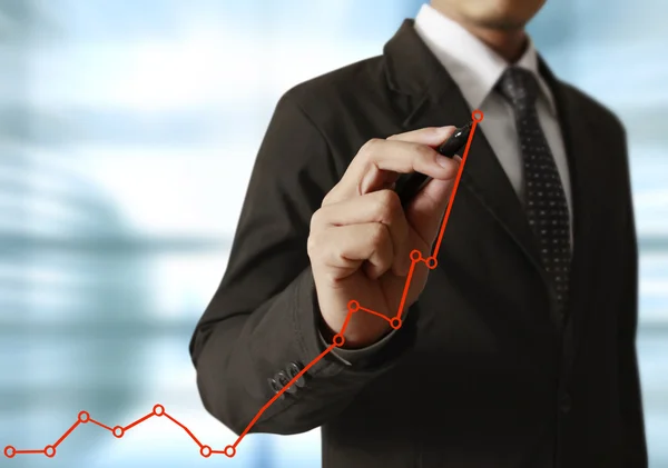 Geschäftsmann Hand schreibt ein Business Graph — Stockfoto