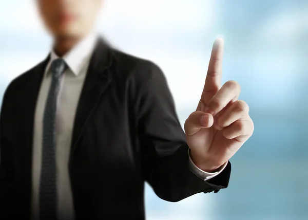 Empresário apontando com um dedo — Fotografia de Stock