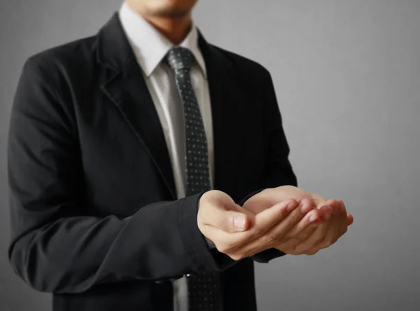 Businessman  with open palm hands gesture — Stock Photo, Image