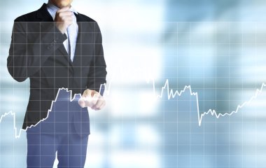 işadamı ile finansal simgeler 