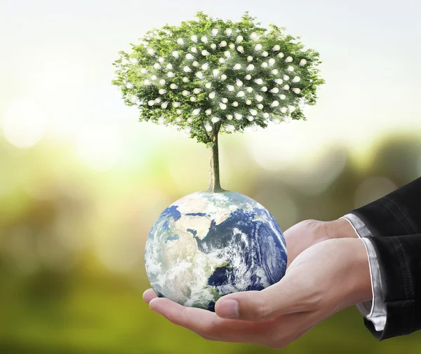 Globus, Erde in menschlicher Hand, Hand hält unseren Planeten Erde glühen — Stockfoto