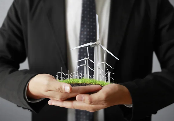 Wind turbines in the hand — Stock Photo, Image