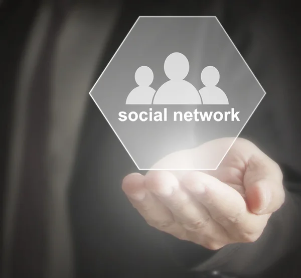 Estrutura da rede social em mãos — Fotografia de Stock