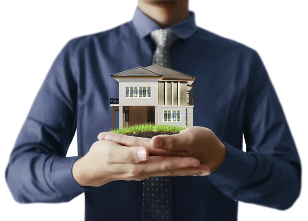 Businessman holding house model — Stock Photo, Image
