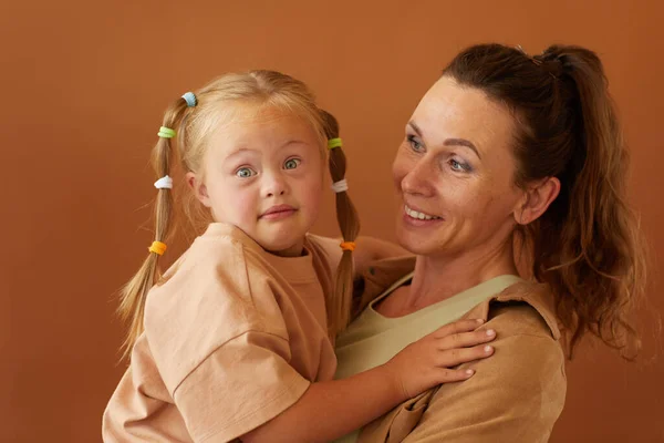 Waist Portrait Happy Mature Mother Holding Daughter Downs Syndrome While — Stock Photo, Image