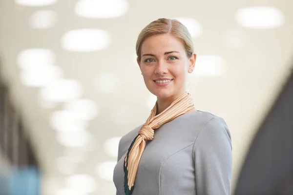 Close Portrait Elegant Blonde Flight Attendant Looking Camera Smiling While — Stock Photo, Image