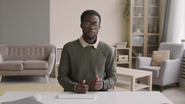 Lockdown Young African Businessman Wearing Smart Casual Clothes Eyeglasses Sitting — Stock Video