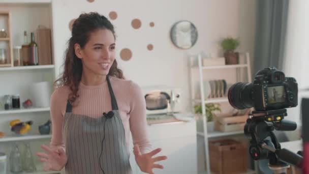 Waist Shot Young Caucasian Female Influencer Wearing Apron Standing Kitchen — Stock Video