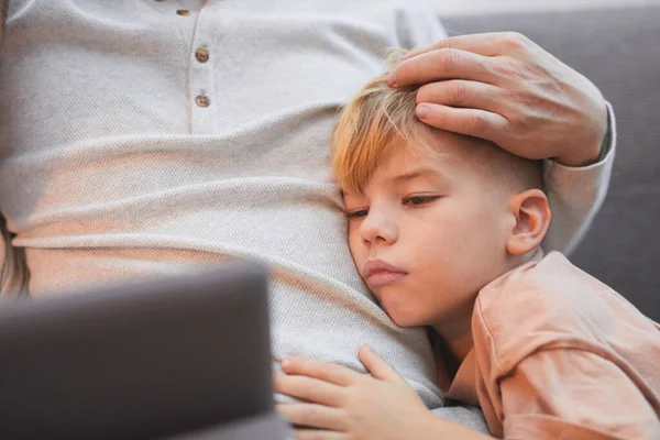 Portrait Cute Blonde Boy Cuddling Fathers Arms Looking Tablet Screen — Fotografia de Stock