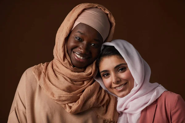 Portrait Two Ethnic Young Women Wearing Headscarves Smiling Camera While — Stock Photo, Image