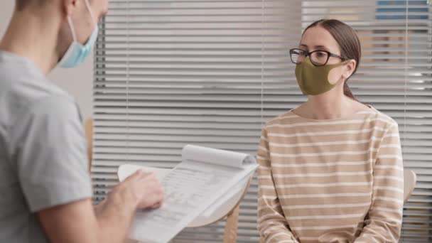 Shoulder Waist Young Caucasian Woman Wearing Glasses Face Mask Sitting — Stock Video