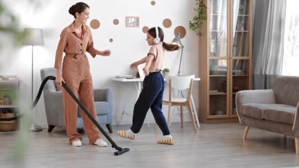 Wide Shot Young Mixed Race Woman Vacuuming Floor Her Apartment — 图库视频影像