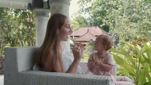 Medium Long Long Haired Caucasian Young Woman Sitting Wicker Armchair — Stok video