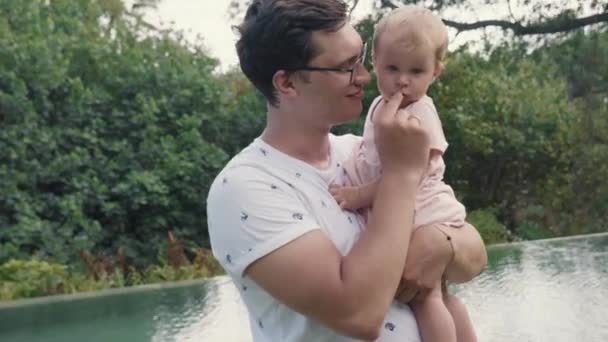 Medium Long Arc Shot Young Caucasian Father Wearing Glasses Holding — Vídeos de Stock