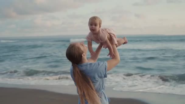 Side View Tracking Long Haired Caucasian Young Mother Smiling Lifting — Stock Video