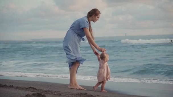 Long Shot Long Haired Mother Long Blue Dress Smiling Holding — Video Stock