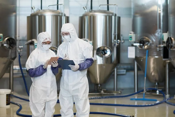 Waist Portrait Two Young Workers Wearing Hazmat Suits While Using — Stock Photo, Image