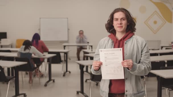 Medium Long Pov Cheerful Caucasian Male Student Standing Foreground Schoolroom — Stock Video