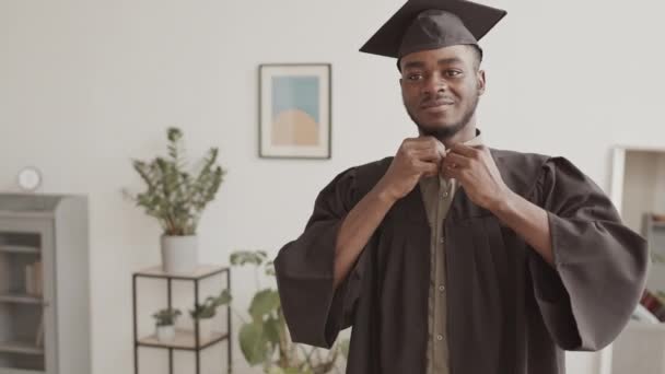 Medium Shot Young African Man Wearing Graduation Gown Hat Standing — Stock Video