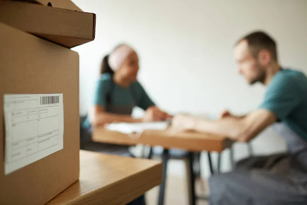 Blurred Background Image Two Young People Unpacking Boxes Doing Inventory — Stok fotoğraf