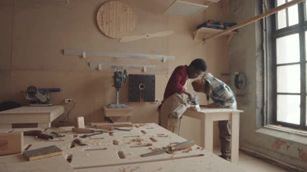 Wide Shot Two Young Diverse Craftsmen Working Workshop African Man — Stock Video