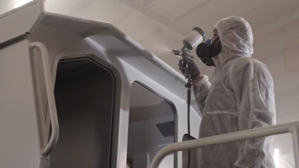 Medium Low Angle Maintenance Person Wearing White Overall Breathing Mask — Vídeo de Stock