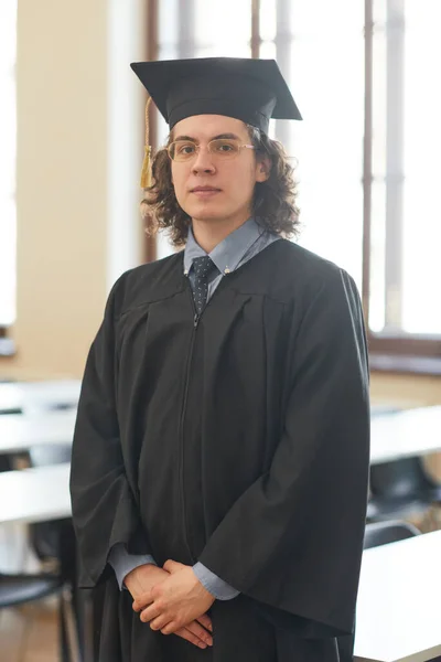 Vertical Portrait Young Man Wearing Graduation Robe Looking Camera While — Stock Photo, Image