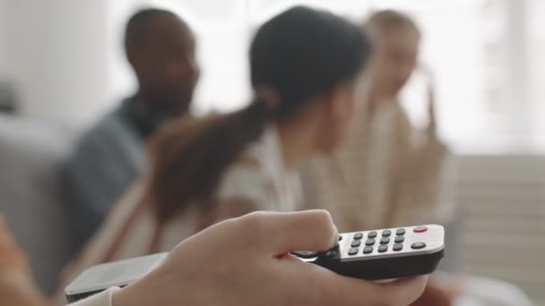 Close Unrecognizable Person Hand Only Frame Pushing Button Remote Foreground — Stock Video