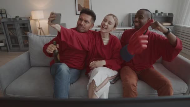 Medium Long Three Caucasian African Men Woman Wearing Matching Red — Stock Video