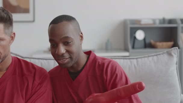 Tracking Left Three Diverse Sports Fans Wearing Matching Red Long — Stock Video