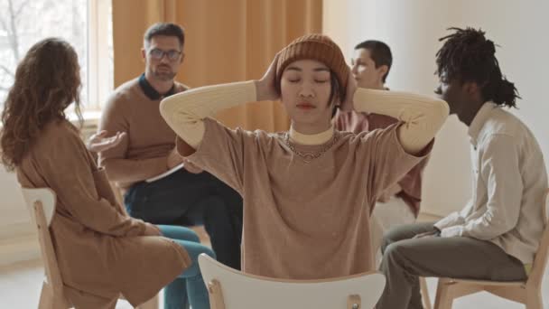 Medium Slowmo Portrait Young Asian Hipster Woman Adjusting Stylish Beanie — Stock video