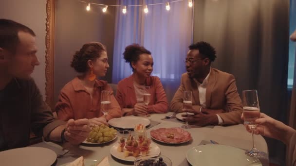 Zoom Out Slowmo Group Young Multiethnic Friends Sitting Festive Dinner — Stock Video