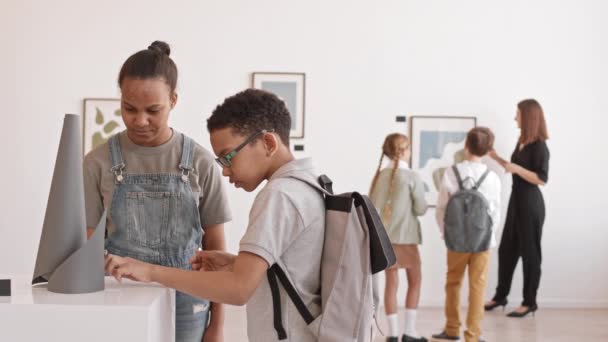 Medium Shot African American School Aged Girl Boy Observing Art — Stock Video