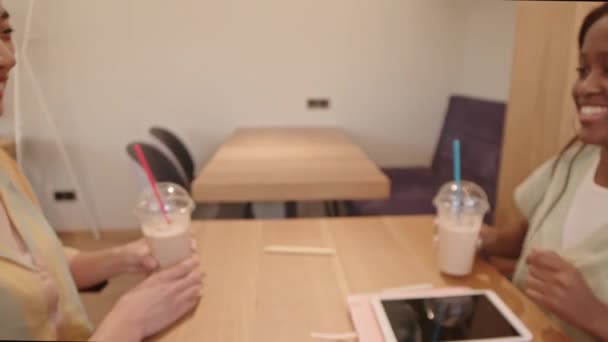 Zoom Out Shot Happy Multiethnic Girlfriends Clinking Plastic Cups Milkshake — 비디오