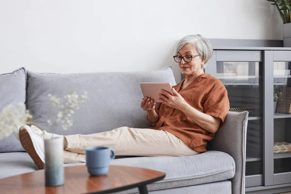Modern Senior Woman Relaxing at Home — ストック写真